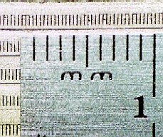 50 micron wide, 750 micron deep microchannels in 316L stainless steel